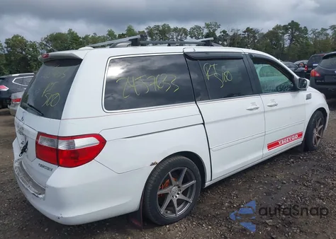 2005 Honda Odyssey Ex-L z USA, uszkodzony, nr VIN 5FNRL38725B108467